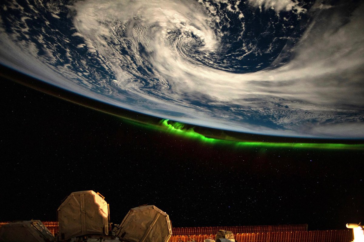 AstroSamantha's tweet photo. In those bright nights around the full Moon you can see features on the planet surface even at night. From the Cupola the view is “upside down” - flying above clouds feels like looking up at the sky from Earth. Cloud gazing and stargazing at the same time! https://t.co/i7eXdO4RtE