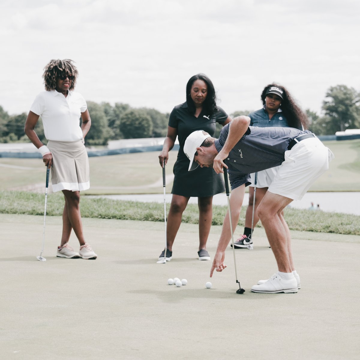 Putt for dough. Great having @BlackGirlsGolf at the #BMWCHAMPS today to participate in a putting clinic with PGA TOUR professional @asmalley_golf.