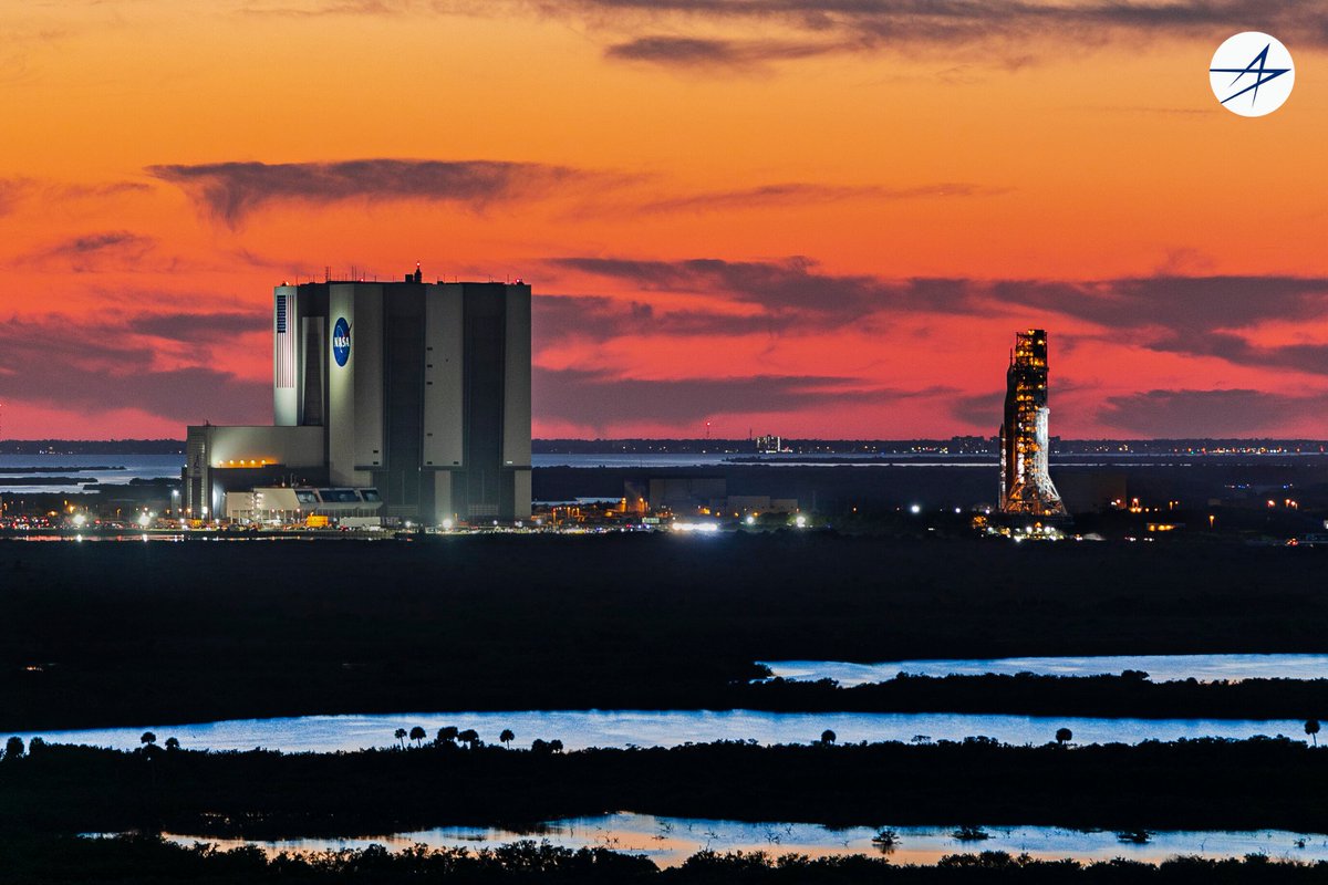 LockheedMartin's tweet photo. It takes up to 12 hours for @NASAGroundSys to roll the 5.75 million pound SLS rocket four miles from the Vehicle Assembly Building to the launchpad, giving us opportunities for sights like this. 🤩

The Mega Moon Rocket is ready to roll to the launch pad tonight! https://t.co/qN0mmfp0f4