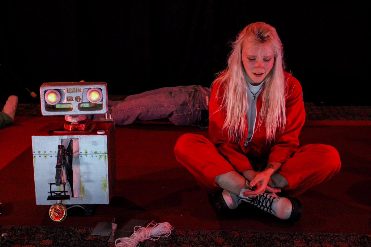 mathews_ty's tweet photo. Robots. Space. Red light. Existential despair. My play "R.E.D." closed with a bang on Sunday. Here are a few pictures from our run at the @KingstonFringe #ygk #Fringe #playwriting https://t.co/aJhSpFOG3w