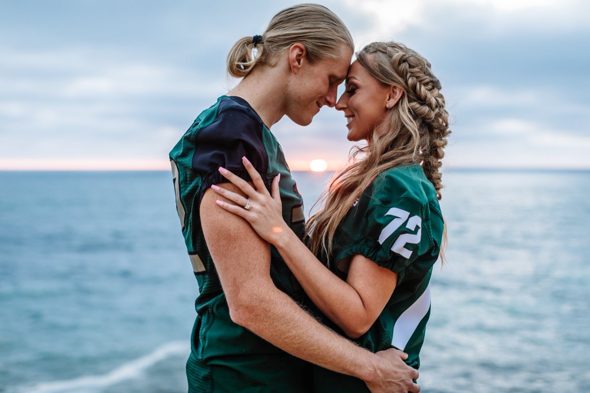 bethaselage's tweet photo. Hey @michiganstateu, remember when my fiancé &amp; I won the contest for MSU's cutest alumni couple of all time? Because it literally just happened 💚🤍💚 #MSUEngagement 
#SanDiegoSpartans #SpartanWedding #MSUAlum #SpartansWill #MarryingASpartanDawg #SoonToBeKlatt #BANKWedding23 https://t.co/rwDBuA5lK1