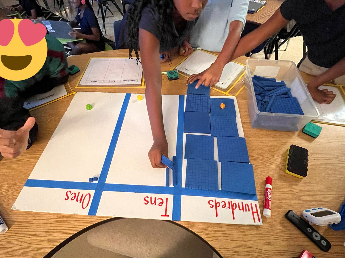 msluz2nd's tweet photo. @km_stieber thank you for your idea of creating a giant HTO chart last year! Today we rolled place value dice and represented 3-digit numbers with base-10 blocks on our giant HTO chart. Ss then drew a pictorial representation! @BirneyBobcats https://t.co/H0nAavyTuB