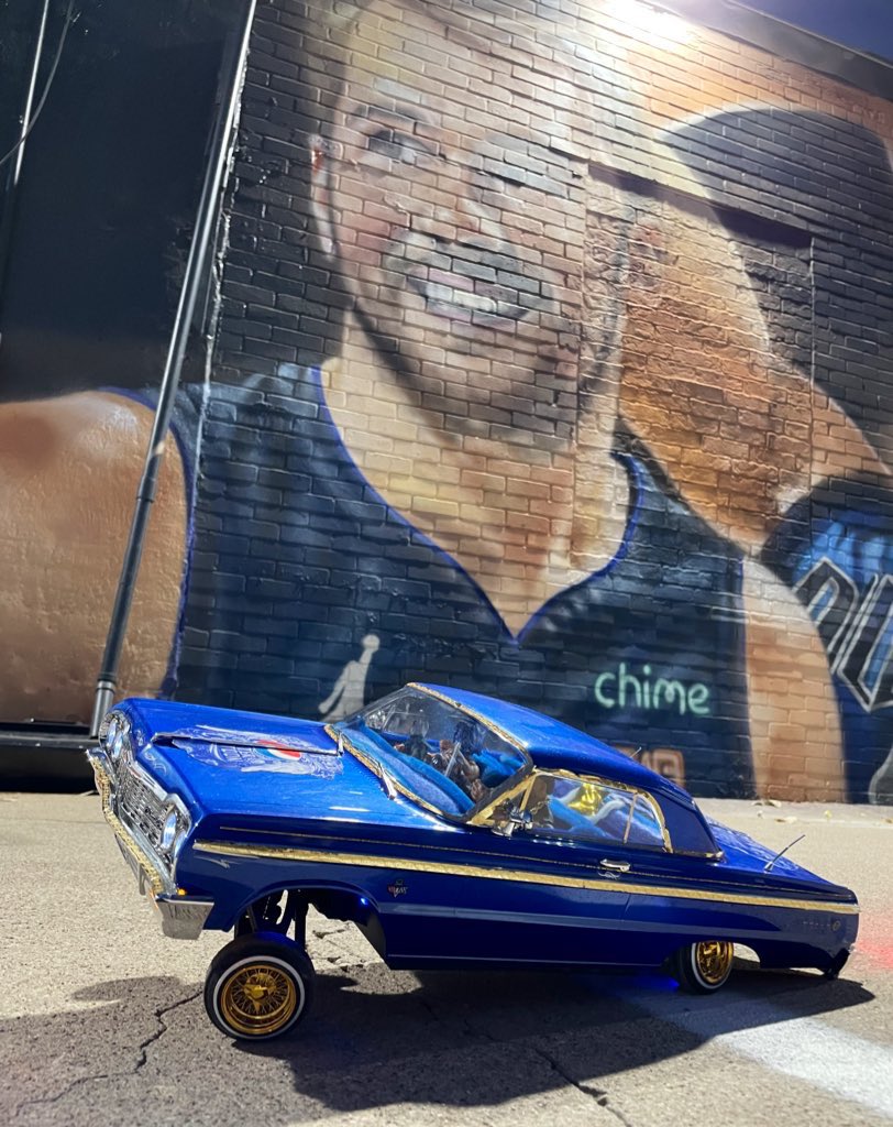 ArtByRoman817's tweet photo. My homie came through with his custom RC Lowrider after we finished the mural to have a small photo shoot 😁 what do y’all think? #LukaDoncic #RClowrider #Mural https://t.co/94xz0ej1ia