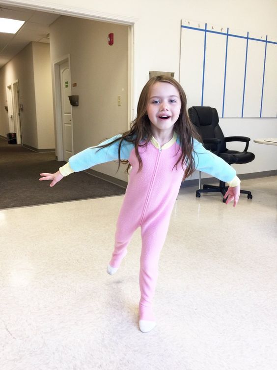 She might be feverish and sick. But at least it means getting to wear jammies all day!