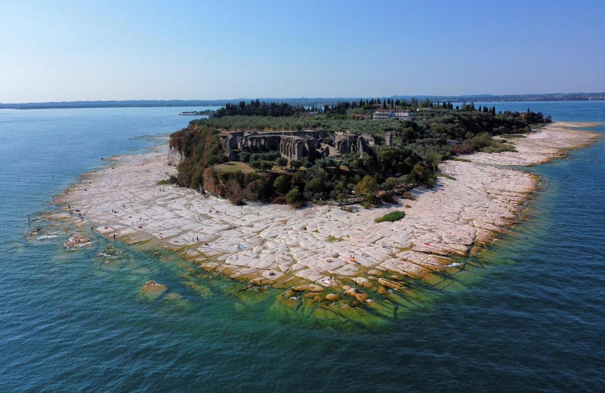 Water Rocks Italy LOOK: Underwater rocks emerge from the water of Lake Garda after ...