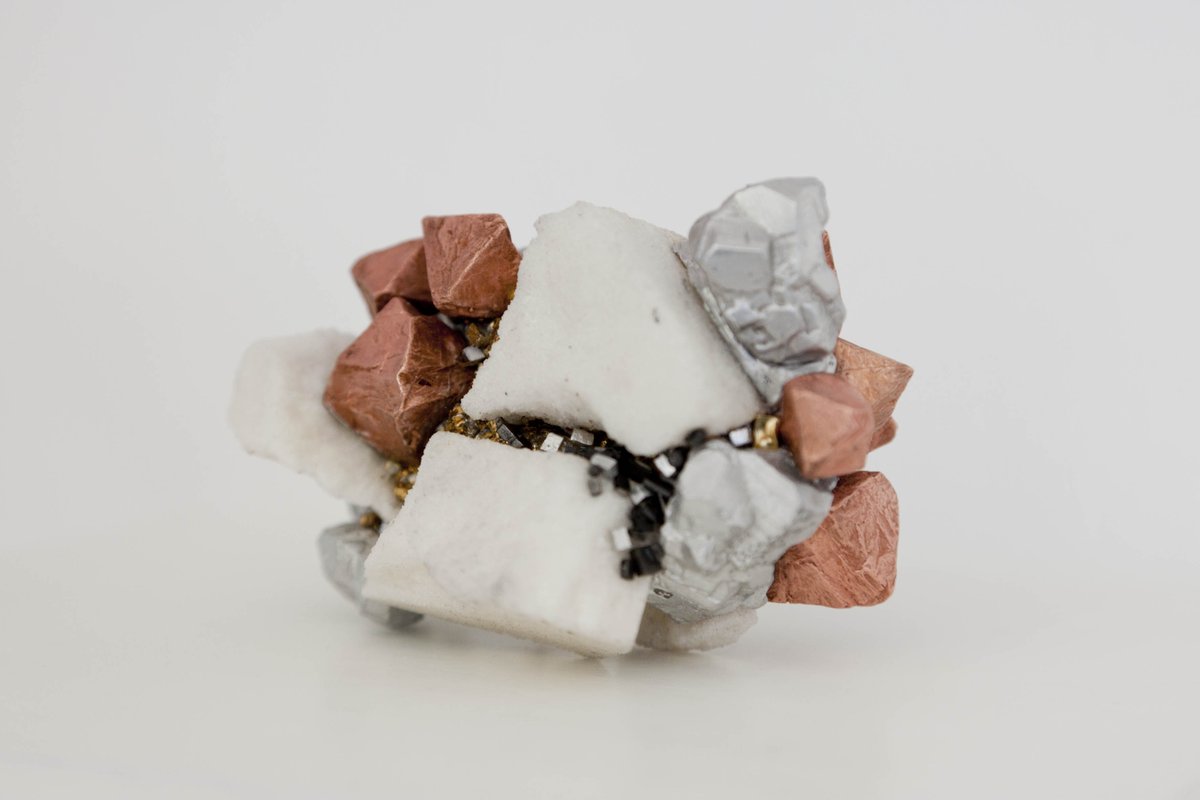 ‘H / AlCuTaAu’ is an artificial composite rock made by <a href="/rc_tvb/">Revital Cohen & Tuur Van Balen</a>. It combines precious metals that were mined from components of electronic devices discarded from a bankrupt company in Amsterdam.