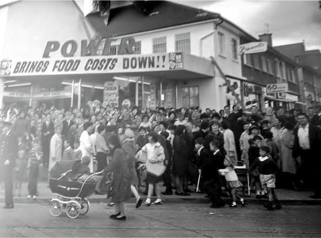 OldDublinTown's tweet photo. Opening day for the new Powers Supermarket on the 8th July 1965 in #Ballyfermot
Kne of the first of the supermarkets to open in Dublin 
Powers later became Quinsworth supermarkets

#LoveDublin
@dublinpeople @bc_partnership
@BCFE_Official @ScuffilC
@DCLAReadingRoom https://t.co/8tuKiJGCpA
