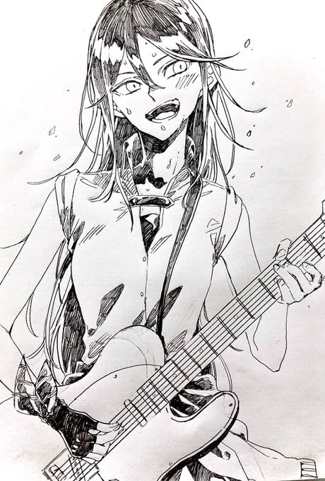ライブ中のギターする一歌さん 