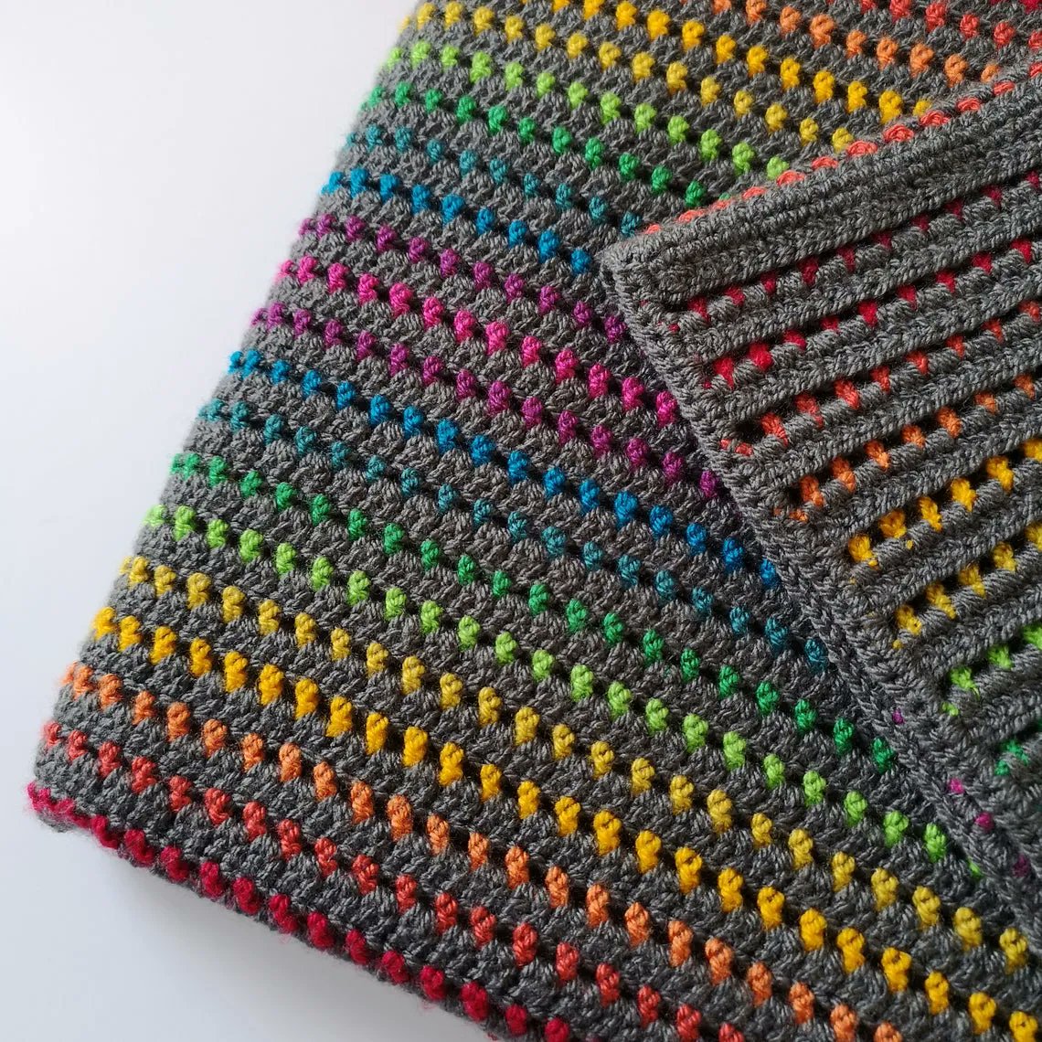 knithacker's tweet photo. Crochet a 'Rainbow Through the Storm' Blanket With a Pattern From Melly Elly Crafts: 👉 https://t.co/UU9ikKsPiH #crochet https://t.co/B7IYPPEL08