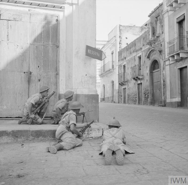 I_W_M's tweet photo. On 17 August 1943, the Allied invasion of Sicily came to a close following the full-scale withdrawal of German and Italian forces.

Here troops of the 9th Durham Light Infantry defend a street corner in the city of Acireale, on route to Messina a week earlier.

© IWM NA 5845 https://t.co/RJfYX24Bxf
