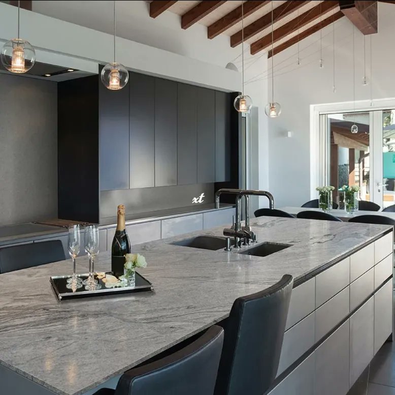 Silver Cloud Granite is a remarkable natural stone that features white, alabaster and ivory base with fog gray, sterling, and jet swirls. 
See more: buff.ly/2J8KCyb⠀⠀

#granitecountertops #granitekitchen #kitchendecor #kitchendesign #kitchenbeautiful