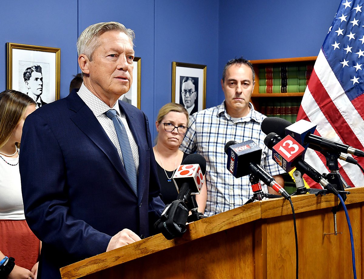 Madison County Prosecutor Rodney Cummings announced Wednesday his office is filing death penalty charges against Carl Roy Webb Boards II in the shooting death of Elwood police officer Noah Shahnavaz as Noah's parents Laurie and Matt look on.