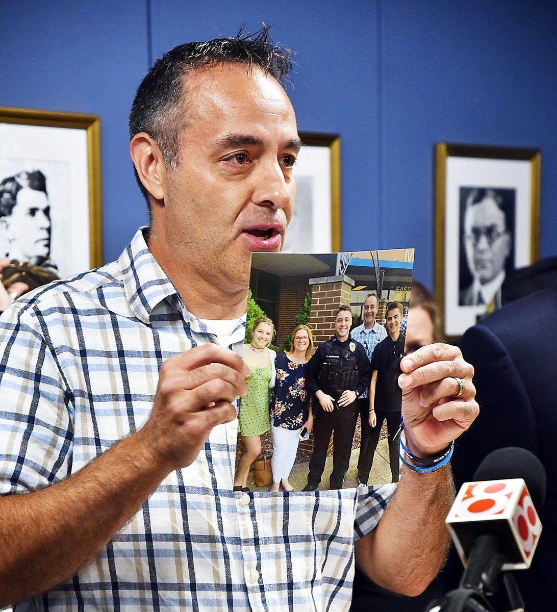 Matt Shahnavaz, father of slain Elwood police officer Noah Shahnavaz, speaks to the media for the first time during a press conference Wednesday holding up a photo of his son saying "remember Noah."