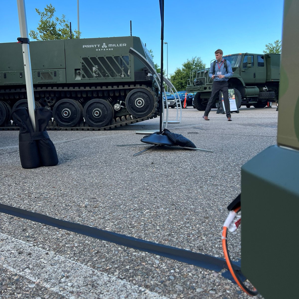 BlueArcEV's tweet photo. A great first day at #GVSETS in Novi talking about the Power Cube™ portable charging applications in the military. We even provided power to our neighbor’s display so they didn’t have to use a noisy generator. #goodneighbor #ShyftGroupProud #EVcharging #EVinfrastructure #NDIA https://t.co/dCDw06tBGB
