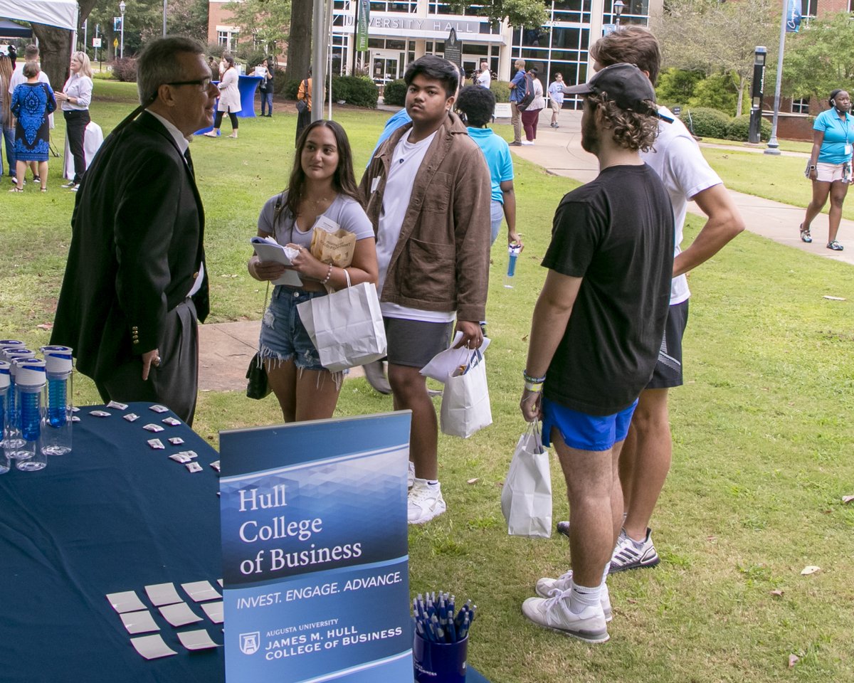 AUG_Hull's tweet photo. Faculty and staff from the Hull College of Business said hello to incoming students at Tuesday’s Freshman Convocation. Members of the Class of 2026 had breakfast and then grabbed some Hull swag under the tent on the Summerville Campus.
#BusinessForLife #AugustaUniversity https://t.co/YkvGXsvf9o
