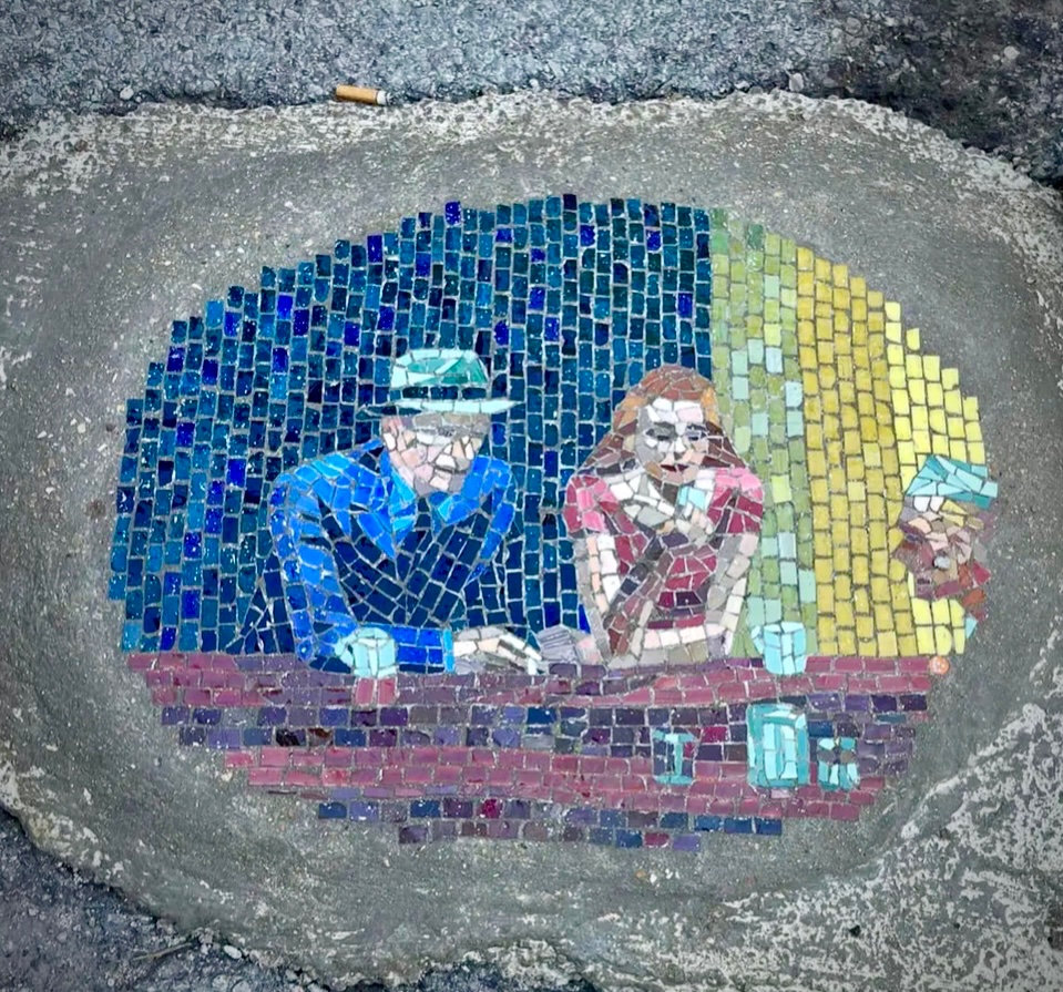 Chicago: Pothole filler art near Estes and Glenwood in Rogers Park.