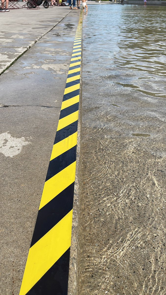 CodeWilliamson's tweet image. Hey @TownofNewmarket this tape is quite slippery at the splash pad. I think your intention was good but the execution lacked thought. My toddler has slipped twice already getting in and out. I suggest removing this.