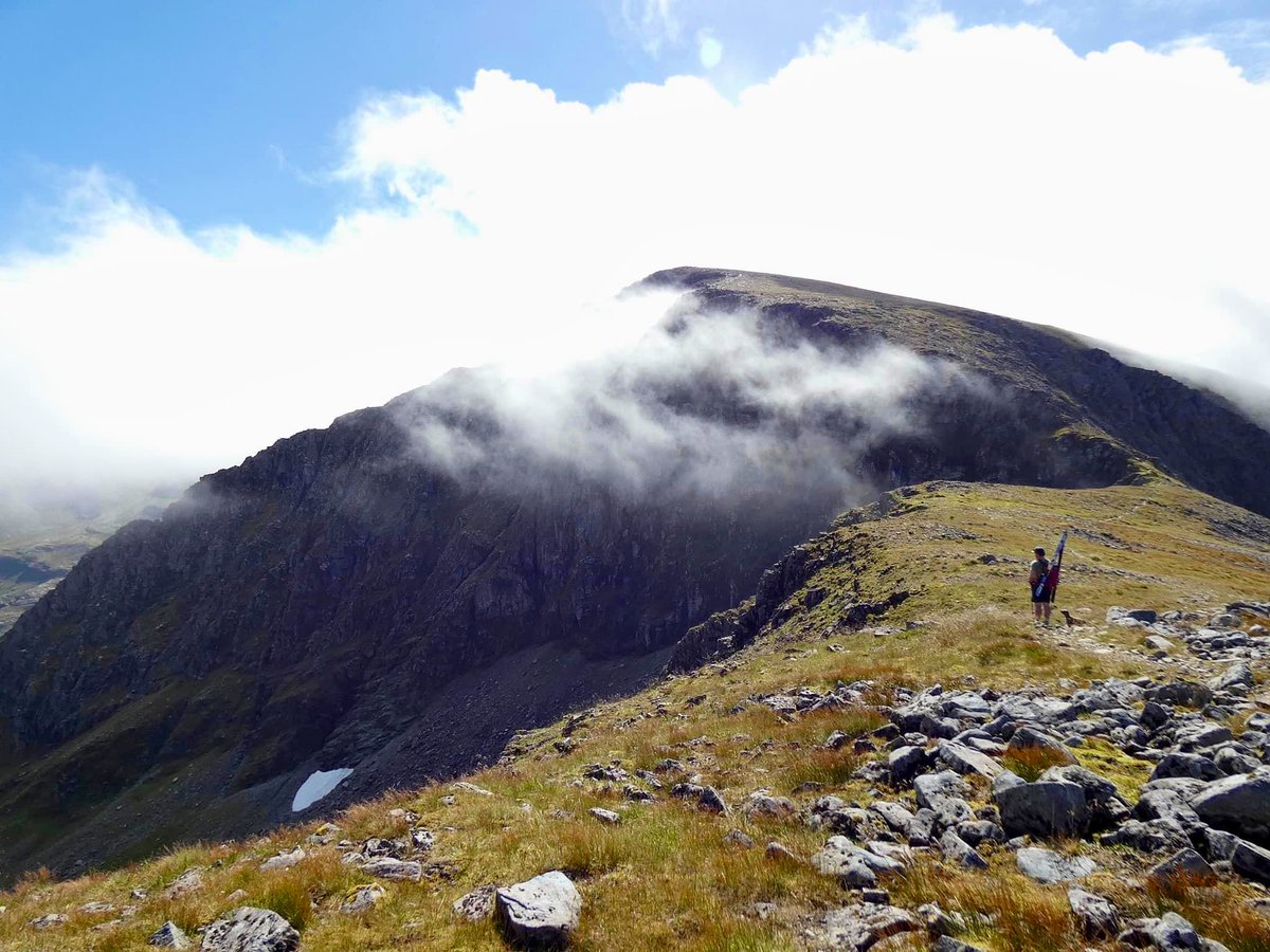 theiaincameron's tweet photo. Supreme effort today by Susan Houston at Aonach Beag. August turns are hard to come by, but skiing one of the few remaining Scottish patches is a trip worth making. Tarn the dog in hot pursuit.

📷 Mikey Houston https://t.co/TNSFQXxav2