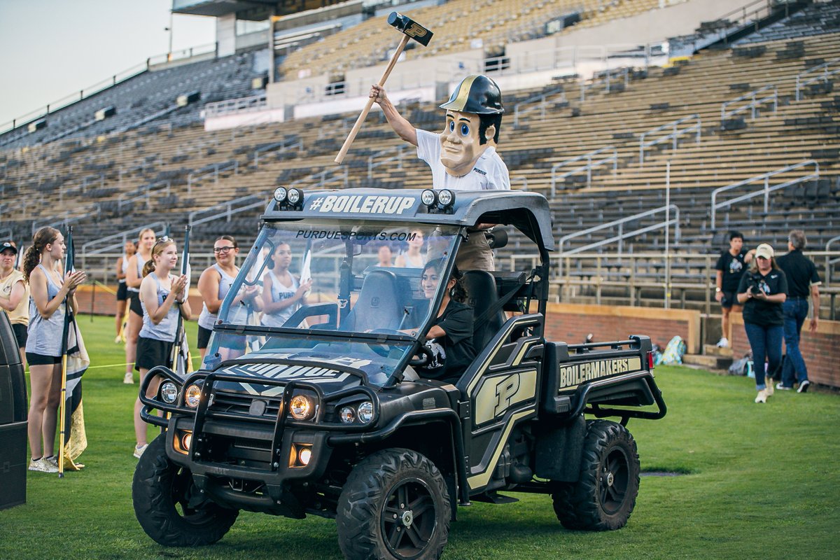 LifeAtPurdue's tweet photo. Will the real #Purdue Pete please stand up? 🎤 President Mitch Daniels made a surprising appearance at Boiler Gold Rush last night. 🚂⬆️ #BGR2022 @allaboardpurdue https://t.co/59gP0F35RS