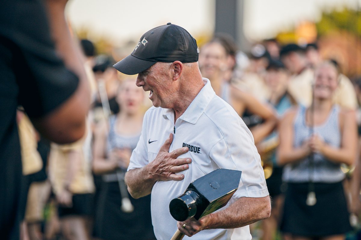 LifeAtPurdue's tweet photo. Will the real #Purdue Pete please stand up? 🎤 President Mitch Daniels made a surprising appearance at Boiler Gold Rush last night. 🚂⬆️ #BGR2022 @allaboardpurdue https://t.co/59gP0F35RS