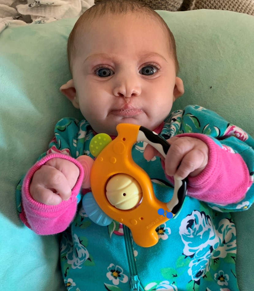 EVC_OakRidge's tweet photo. Miss Penelope is working hard on reaching, grabbing and holding skills! We think she's doing a pretty amazing job! #EarlyIntervention #EmoryValleyCenter https://t.co/tcCLUPXaDy