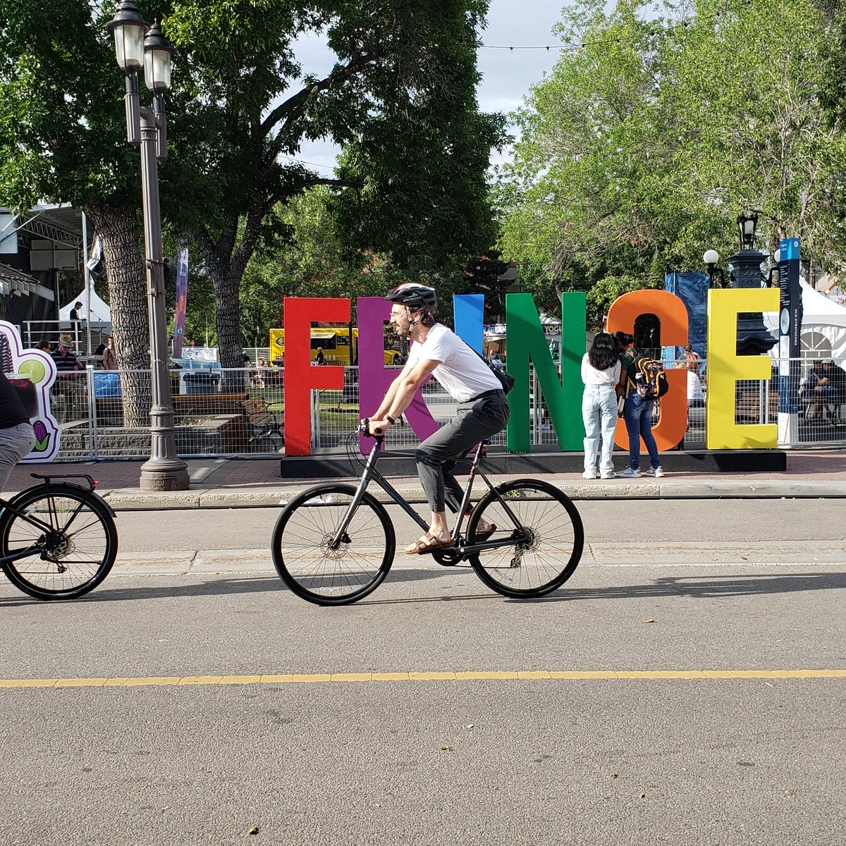 I've seen so many people biking and scooting through the #yegFringe this year that we can no longer accept blocking the southside bike lanes without proper detours. This is just too busy a transportation network now. #yegBike #yegcc