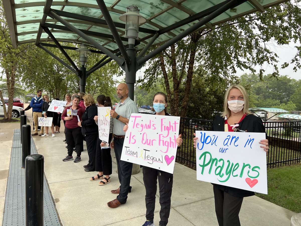 FollowMercy's tweet photo. Our co-workers support each other, through thick and thin. Tegan Bough, who works at #MercyNWA, was recently diagnosed with a rare and aggressive form of breast cancer. Today, a crowd of co-workers and friends cheered her on as she left for MD Anderson. #TeamTegan #FacesofMercy https://t.co/1lHmTL9uua