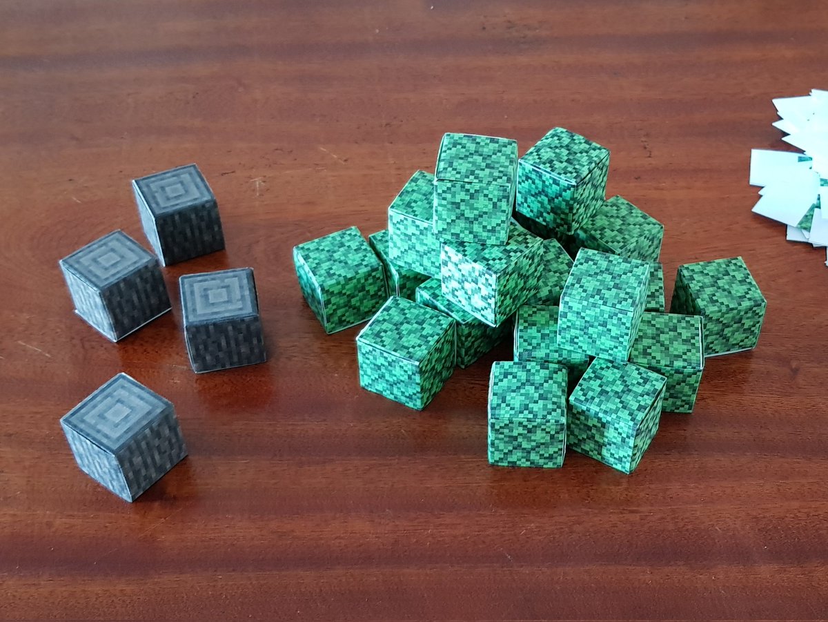 My stack of Minecraft origami cubes is getting bigger, the next step will be to join them. #Minecraft #origami