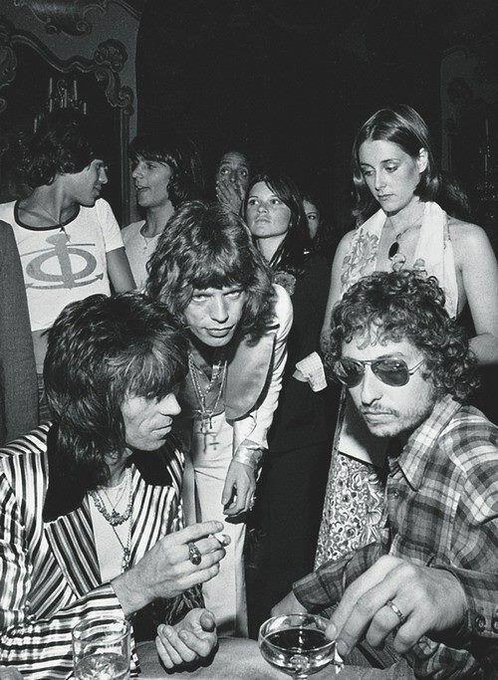 Keith Richards, Mick Jagger, and Bob Dylan at Jaggers 29th birthday party, July 1972 in New York City.