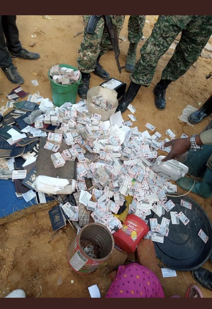 News247Ug's tweet photo. During the @nemaug operations in Lubigi ,Akim and his wife Nayebale Rahuma found in possession of a huge no of National IDs,passports, Vehicle number plates and academic documents in their temporary structure around Lubigi swamp .@News247Ug updates 
As if they owned @NIRA_Ug https://t.co/IKzeyHsscc