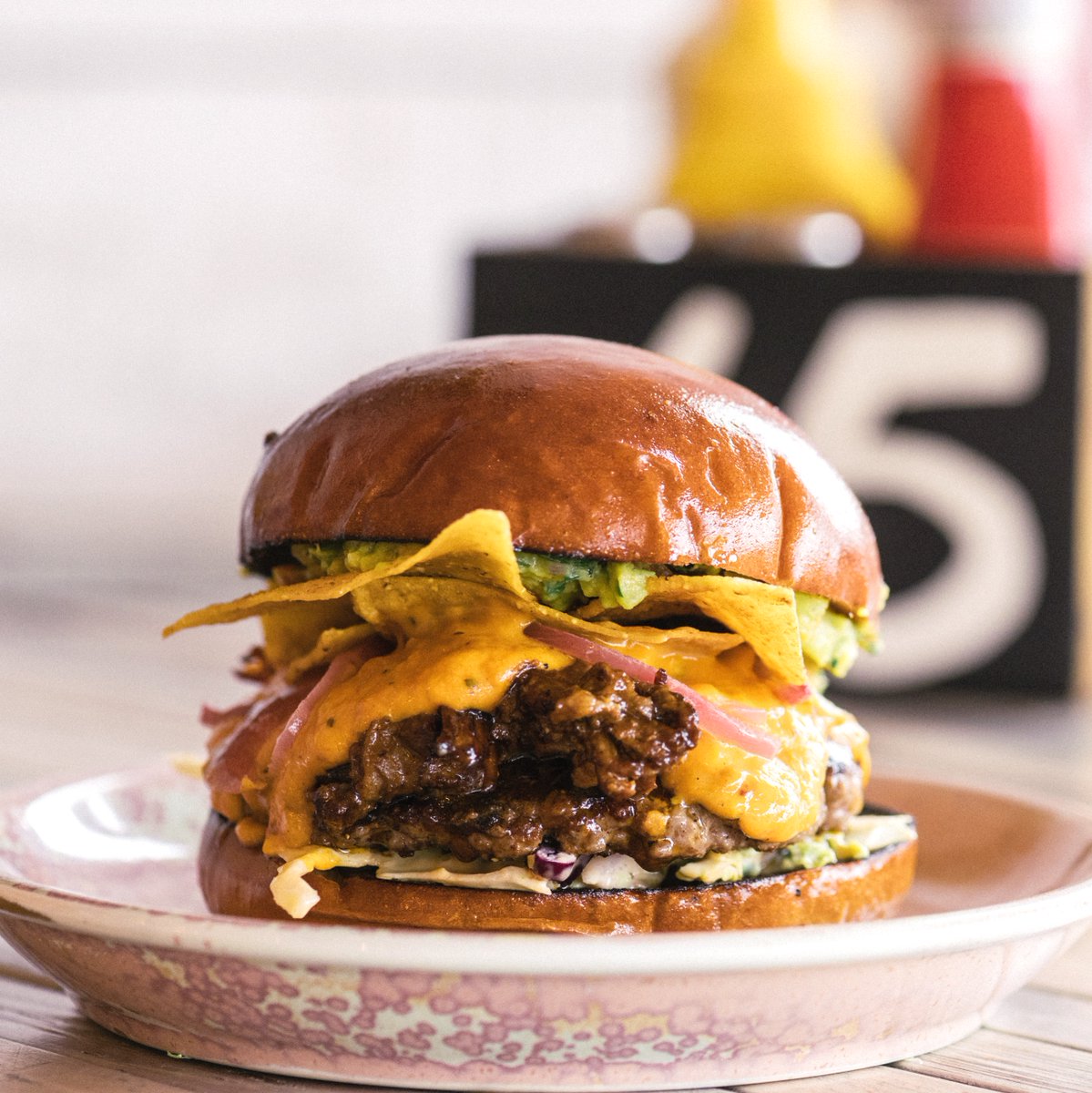 It's #NationalBurgerDay and there's only one way to celebrate - with some flame-grilled goodness. 🔥 We can't resist @HubboxSW's Rocky Barbacoa! 🤤 This is one 🍔 worth getting your hands dirty for! 👌