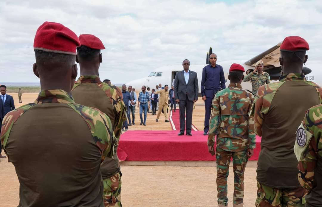 SomCusub's tweet photo. The PM of the FGS H.E Barre and a delegation led by him including ministers and parliamentarians arrived in Beledweyne, the capital of Hiran region. The purpose of the PM's visit is to observe the drought situation and encourage the armed forces fighting against the terrorist Gp. https://t.co/sGB1UwRFbr