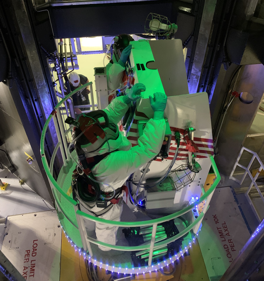laserdriver's tweet photo. Operators preparing to board the lift system to enter NIF's 10 meter diameter target chamber for surveys and maintenance during our quarterly outage https://t.co/hhH99KPcT1