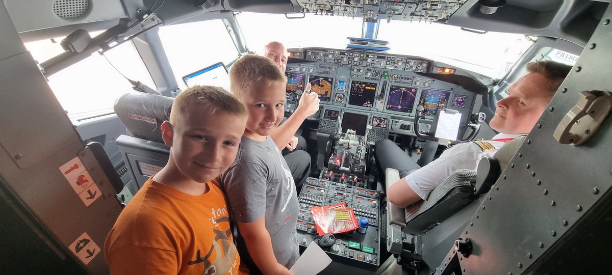 StaceyB_RVN's tweet photo. What a treat for the boys on our Ibiza return flight to Newcastle. Getting to see the flight deck, meet the crew and they decided to make captains of their baby Yoda's and The Red Arrows bear @jet2tweets https://t.co/5P73PoX3gY