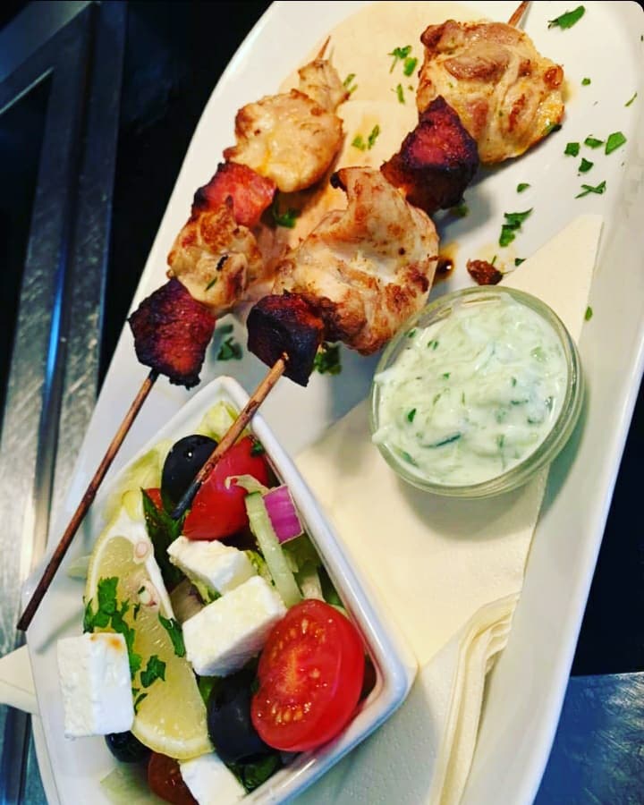 Look at what's back! Lemon chicken skewers with the addition of chorizo! Greek salad and flatbread....perfect for these hot days where a light bite is just the right size! #redhillaerodrome #familylunches #letsgetlunch #surreyfamilies