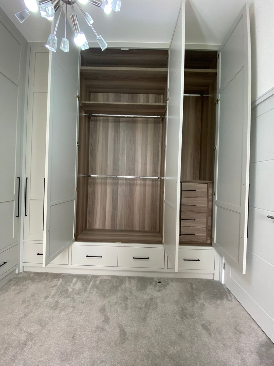 Bespoke 3m high #dressingroom designed & installed with internals @FinsaUK nogal Siena, shoe display with remote lights, soft runner drawers, corner unit doors with 150-degree hinges for total access, finished in @FarrowandBall pavilion grey ow.ly/Fj9M50KlfBp #furniture