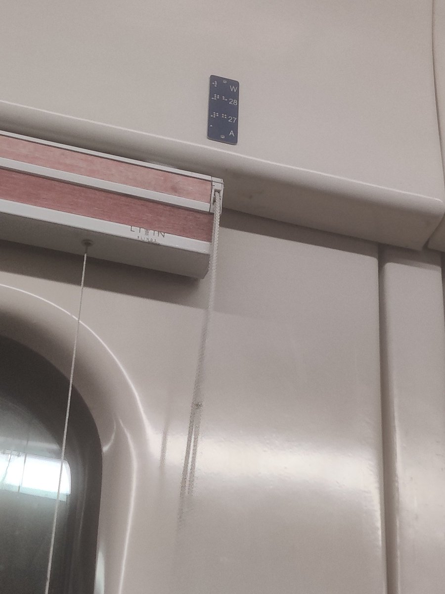 deekshachandva1's tweet photo. So yesterday I travelled in vistadom coach from MAO to CSTM and I saw something amazing Braille being used for seat number and seat type. Good work @RailMinIndia. But the position of text, it's at so much height that a normal person can't even touch it, pretty useless feature. https://t.co/hEiIxoWPec