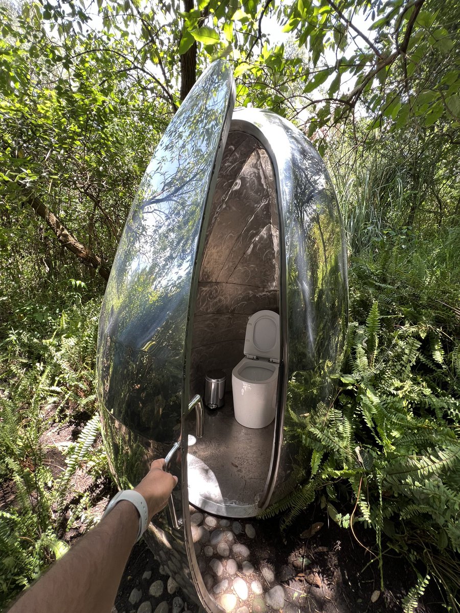 Also this in the garden of the same place… a silver egg with a toilet inside