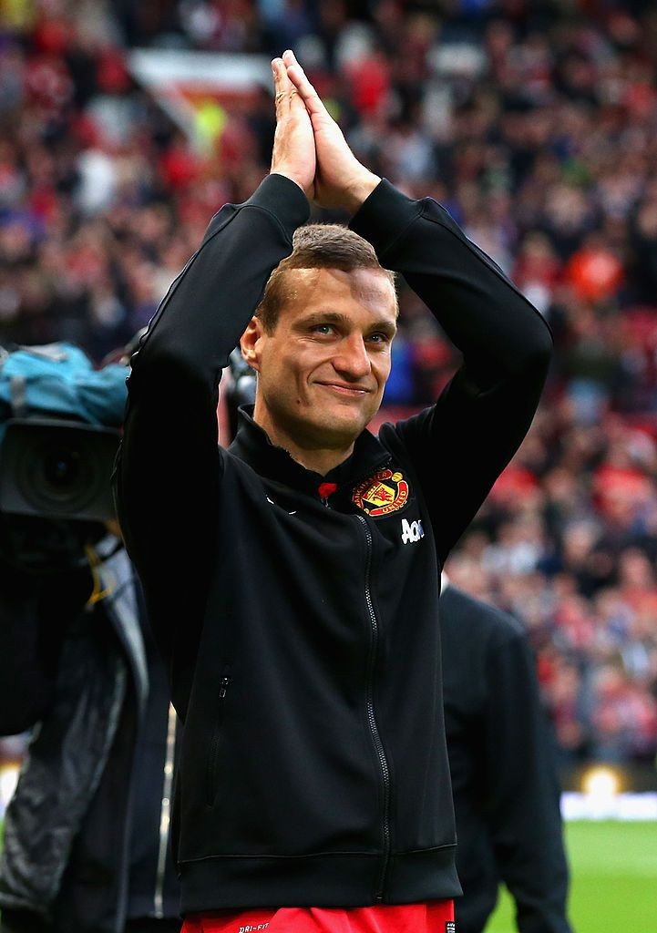 Nemanja Vidic salutes the crowd ahead of his final home game for United. May, 2014.