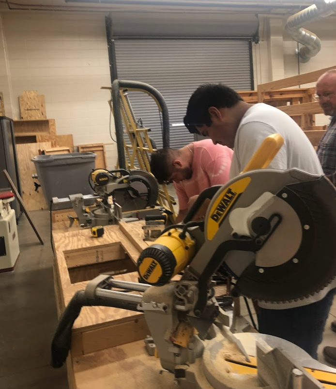 Mr. Penuel's wood shop students are working hard.