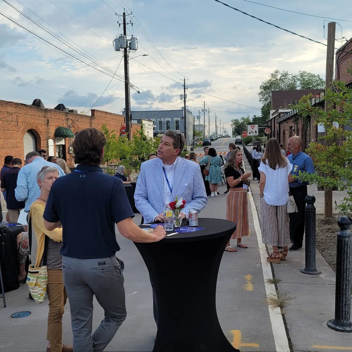MainStreetAl's tweet photo. Opelika Main Street hosted a fun social for LAB attendees last night on First Avenue in downtown Opelika. #LAB22 https://t.co/KA5SoLczF4