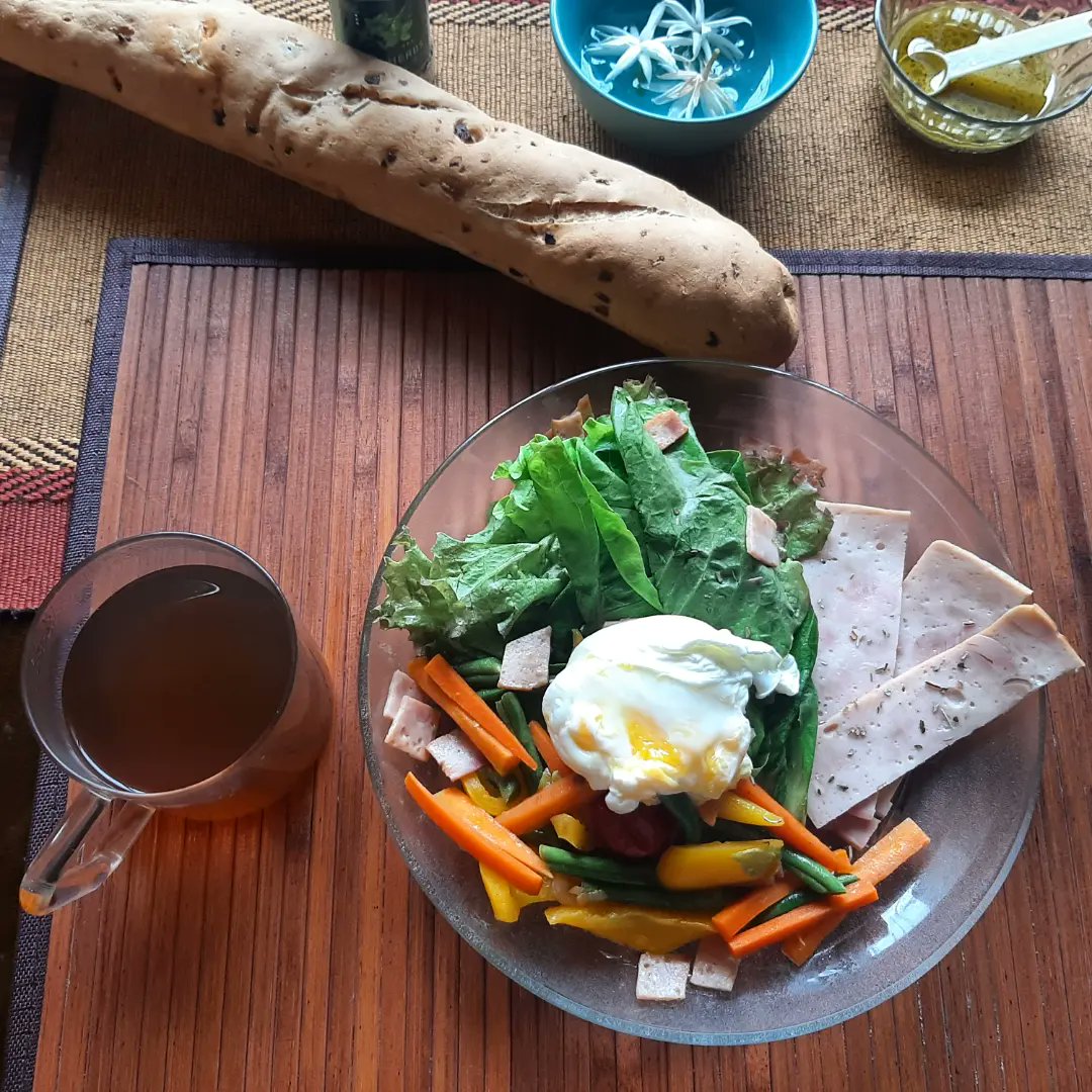 Made Salade Lyonnaise with bacon strips, poached egg and baguette for mom dad's anniversary yesterday. (That poached egg needed some practise, but it came out almost perfect finally!) #breakfast