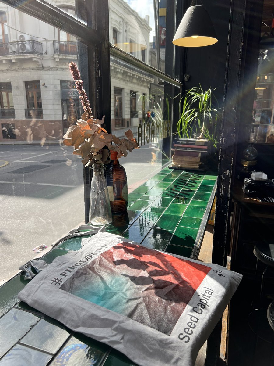 blockbird's tweet photo. Out and about minting @finiliar’s with my @FingerprintsDAO @_terra0 @SeedCapitalNFT tote bag, at an old pharmacy turned cafe, in the old town of Montevideo… goooood living, lol https://t.co/5AQpH2YCsC