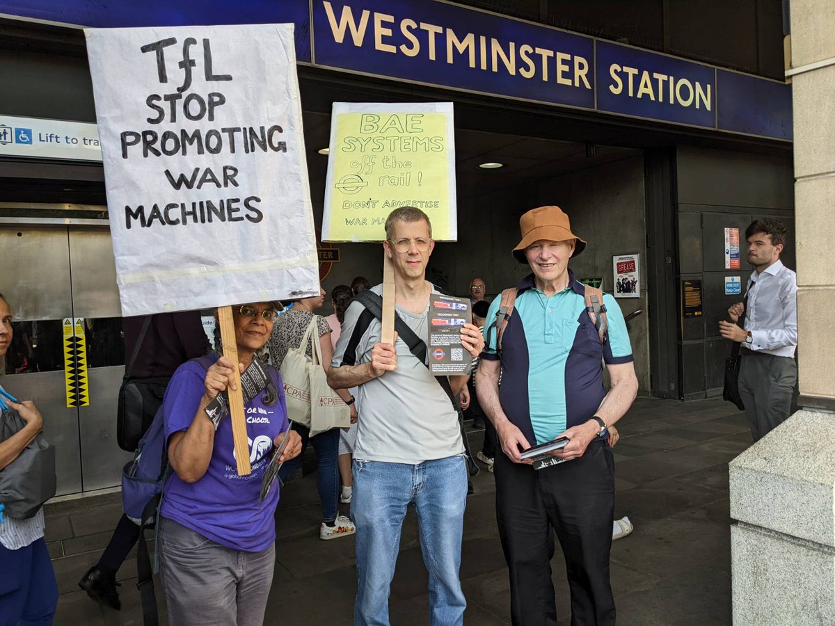 londoncaat's tweet photo. Outside Westminster tube saying no arms companies on the tube. BAE Systems have had an advert in this station for years and we are calling for it to be removed. BAE arms repressive regimes and has no place on the tube. Sign the petition here https://t.co/QUGy9hNLEo #banbae https://t.co/Havw2B8PzN