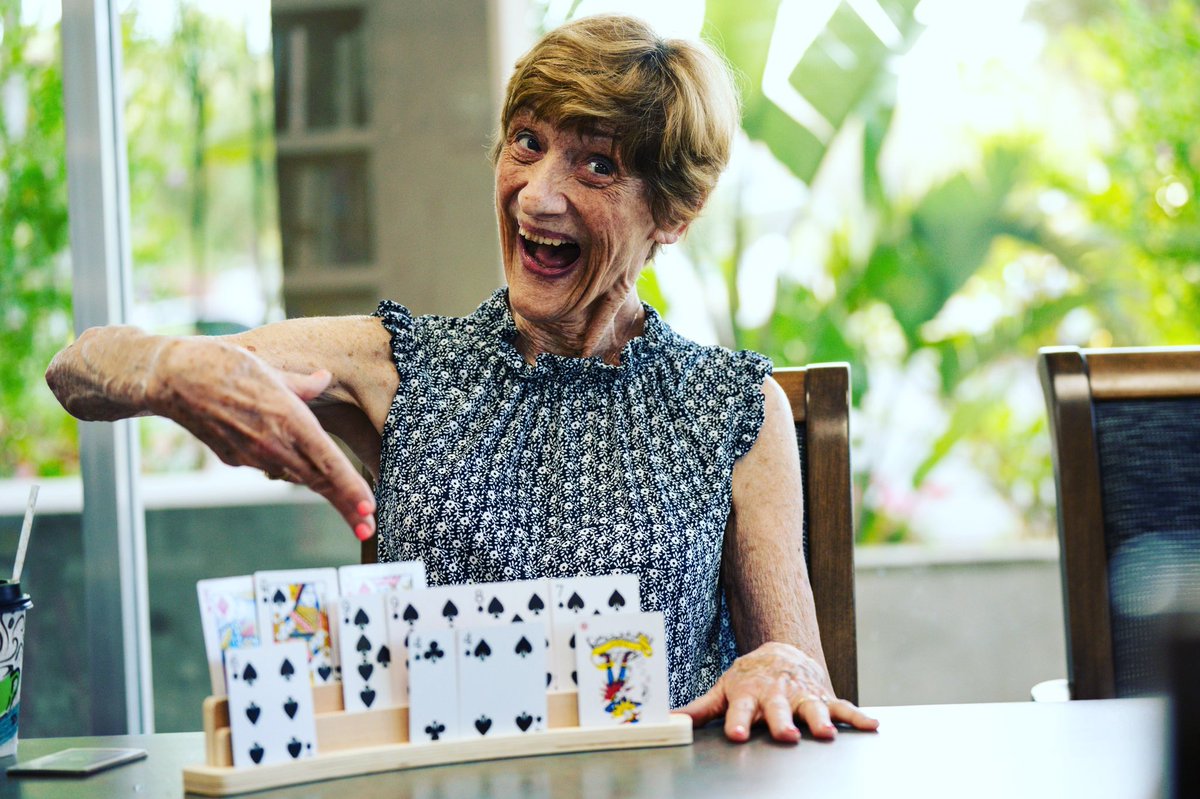 Sandy showing off her new card holder! Anybody up for a game?

#lovelifehere #VenturaTownehouse #luxuryseniorliving #retirementcommunity #venturacalifornia