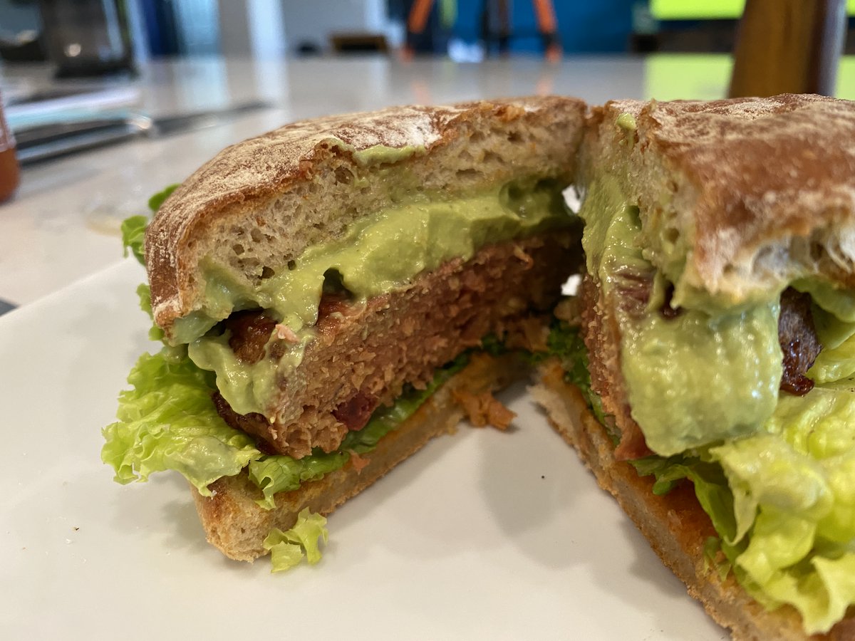 OptamizApp's tweet photo. Want a plant-based burger for you AND your carnivore friends? With Dr. Praeger's Perfect Burger you can finally eat the same meal as your guests. Even our carnivore friends love their burgers! (This one has avocado creme, sriracha, lettuce, and a Dave's Killer burger bun.) YW ;-) https://t.co/BvrmNcygOf
