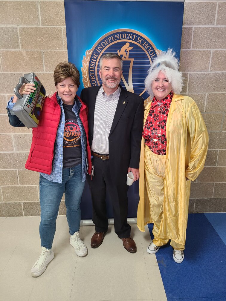 NISDScobee's tweet photo. Marty McFly and Doc Brown came in for NISD’s Ignited Convocation. @NISDScobee is going Back to the Future this year, because where we’re going, we don’t need roads! @briantwoods1 @jdudney5 @Carrie_C_Gray https://t.co/9vE0Xs0VXK
