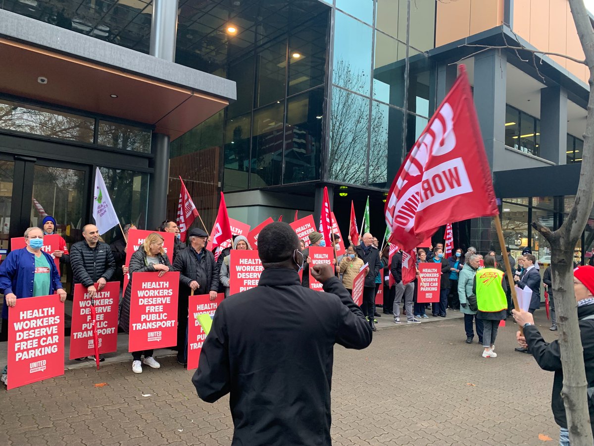 UnitedWorkersOz's tweet photo. Solidarity with the 100+ health workers from SA hospitals, striking today in the fight against steep car parking and transport fees. Low paid frontline workers should never need to worry about affording steep parking fees! #CostOfLivingCrisis @SAUnions #auspol https://t.co/e6K8JPHQm6