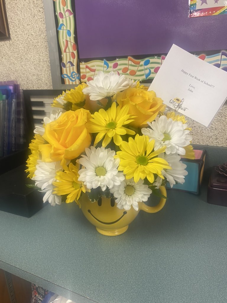 mcentireruth's tweet photo. Beautiful flowers to end the 2nd day of school! I’m thankful for a supportive husband. https://t.co/s4PvMzqe4N