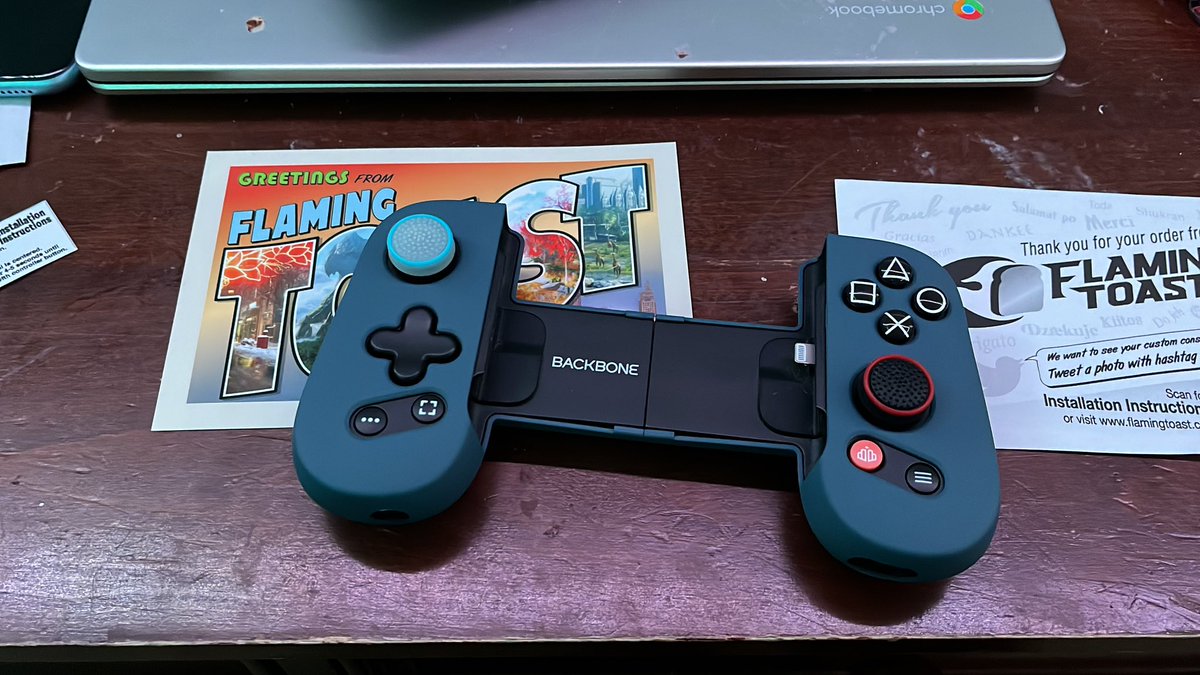 RyderPlayz115's tweet photo. Ayeee my @backbone One is finally upgraded! Thank you to @ToastyStickers and @TudiaProducts for the PS buttons and the case 🧡🖤 #ToastyStickers #backbone #backboneone #upgrade #upgrades #PlayStation #Tudia #phone #controller https://t.co/tXUQwk4ii1